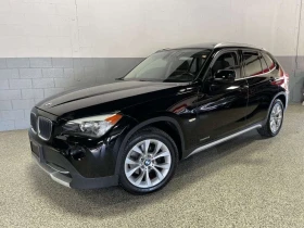 BMW X1 * 28i/X DRIVE/PANO ROOF/BLUETOOTH/ HEATED SEATS * 