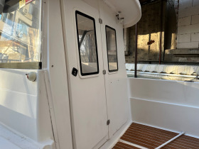 Лодка Quicksilver Silver 500 pilot cabin, снимка 4 - Воден транспорт - 44396713