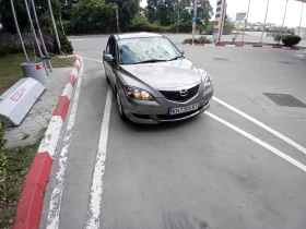 ������ Mazda 3