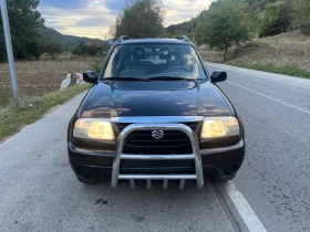 Обява за продажба на Suzuki Grand vitara 1.6* Климатик* Холандия* Роубар* Теглич ~8 899 лв. - изображение 1