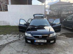 Mazda 323 F, снимка 1