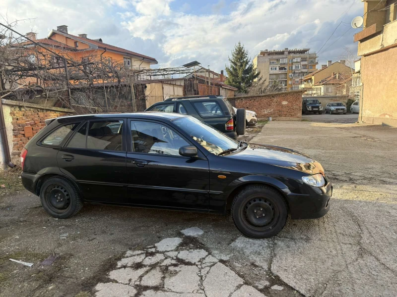 Mazda 323 F, снимка 10 - Автомобили и джипове - 53295176