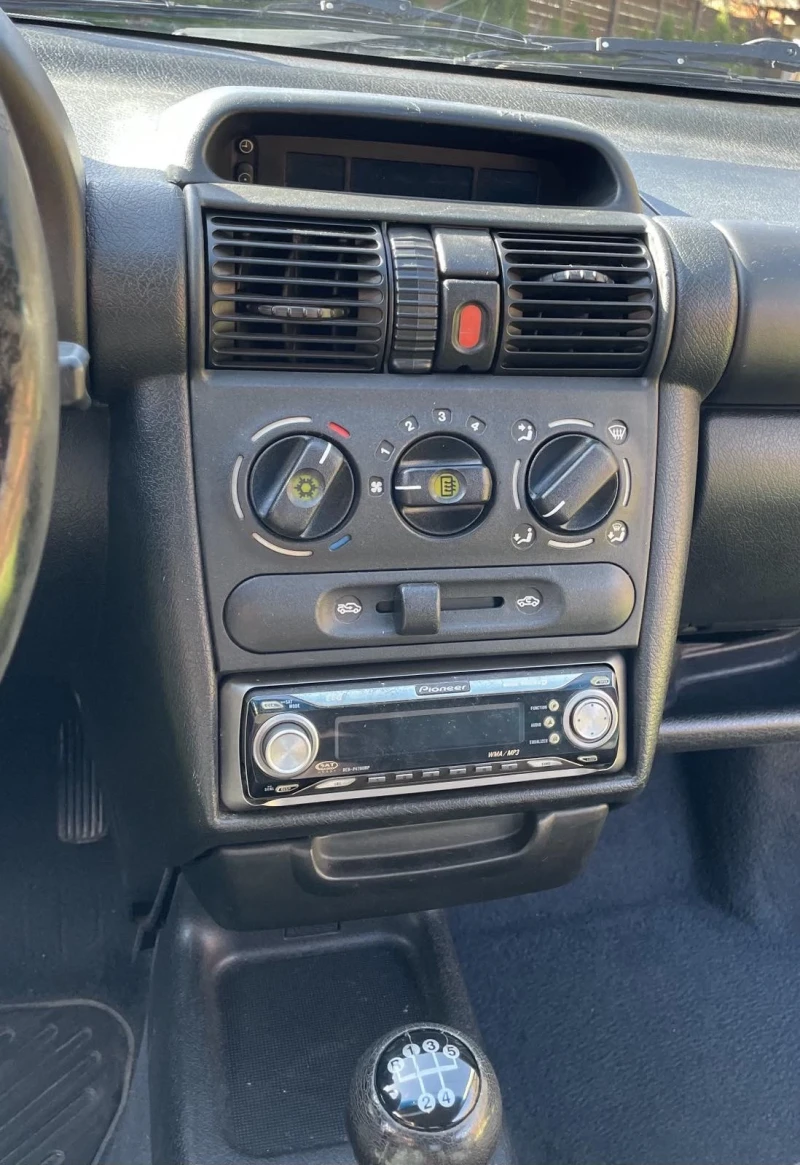 Opel Tigra 1.4, снимка 13 - Автомобили и джипове - 52433915