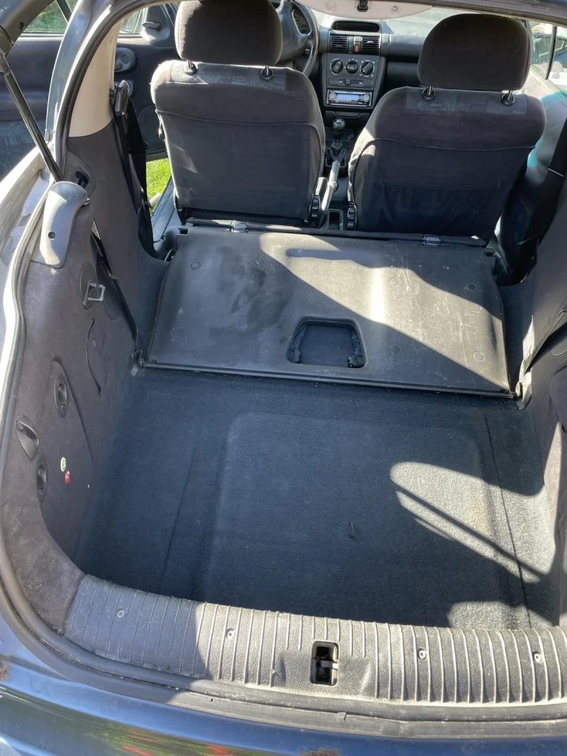 Opel Tigra 1.4, снимка 9 - Автомобили и джипове - 52433915