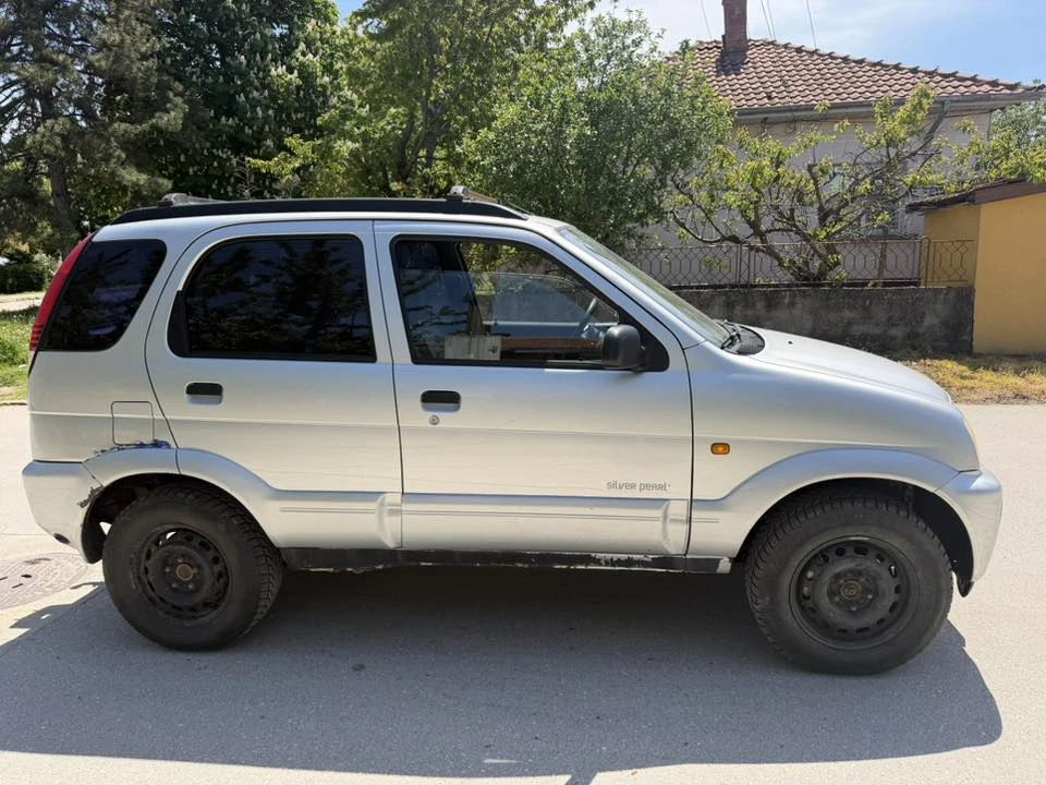 Daihatsu Terios 1.3 4x4 LPG Klima, снимка 12 - Автомобили и джипове - 54206526