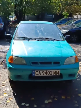 Suzuki Swift 1.0 i, снимка 1