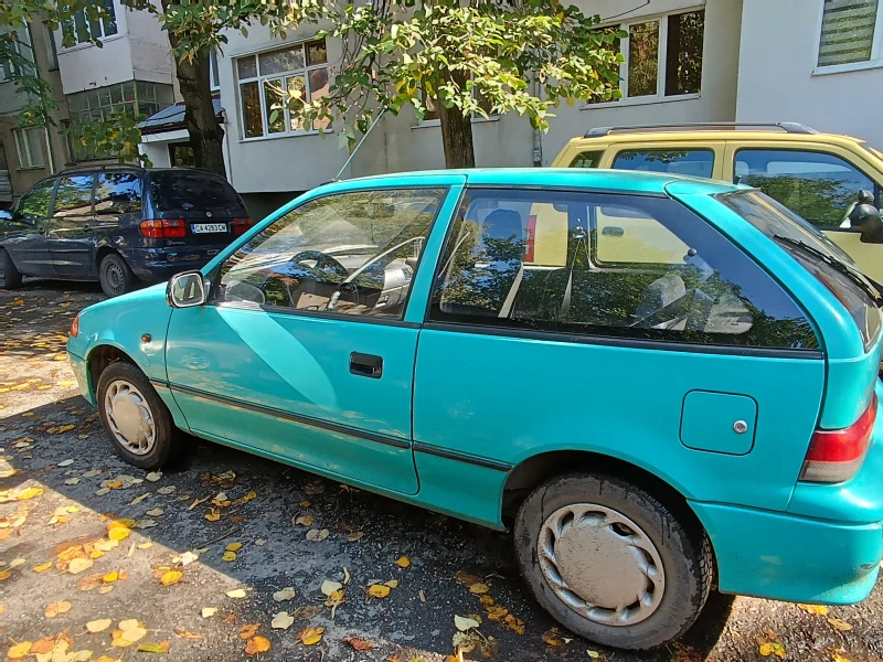 Suzuki Swift 1.0 i, снимка 5 - Автомобили и джипове - 47560277