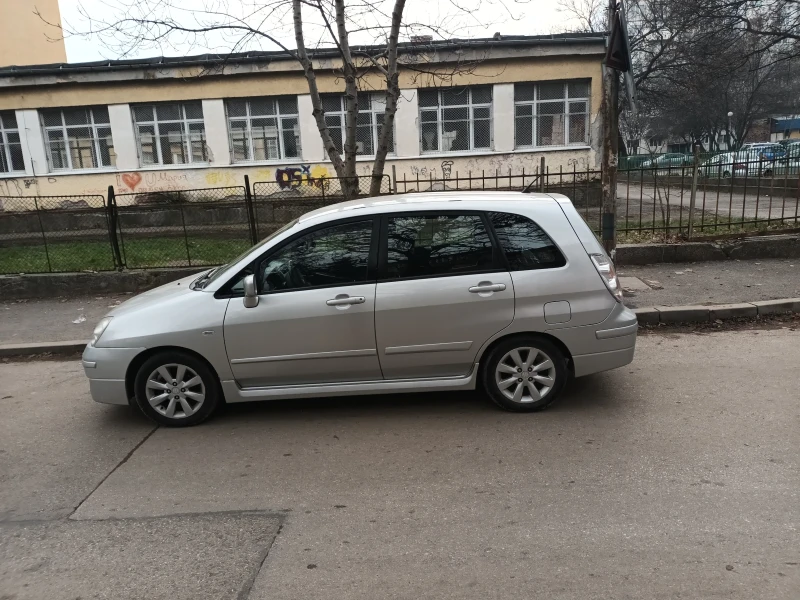 Suzuki Liana, снимка 7 - Автомобили и джипове - 48674544