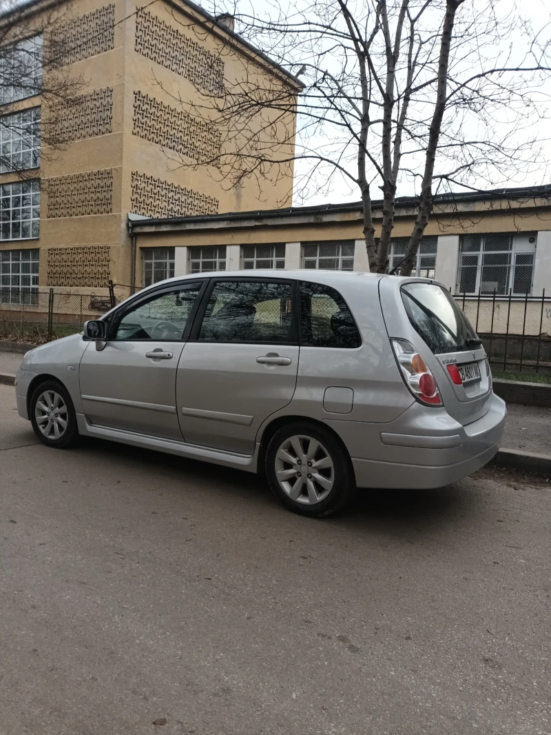 Suzuki Liana, снимка 6 - Автомобили и джипове - 48674544