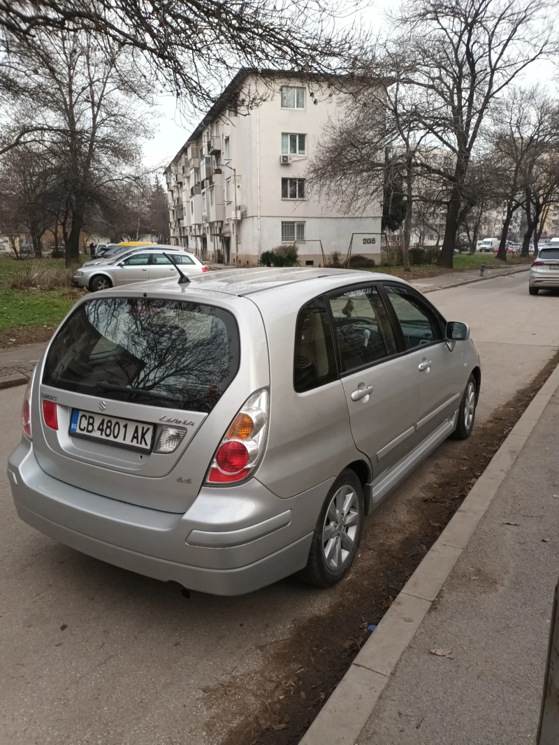 Suzuki Liana, снимка 5 - Автомобили и джипове - 48674544