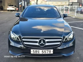 ������ Mercedes-Benz E 200