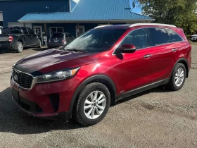 ������ Kia Sorento