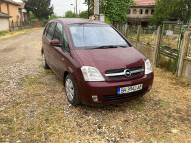 Opel Meriva, снимка 1 - Автомобили и джипове - 45426838