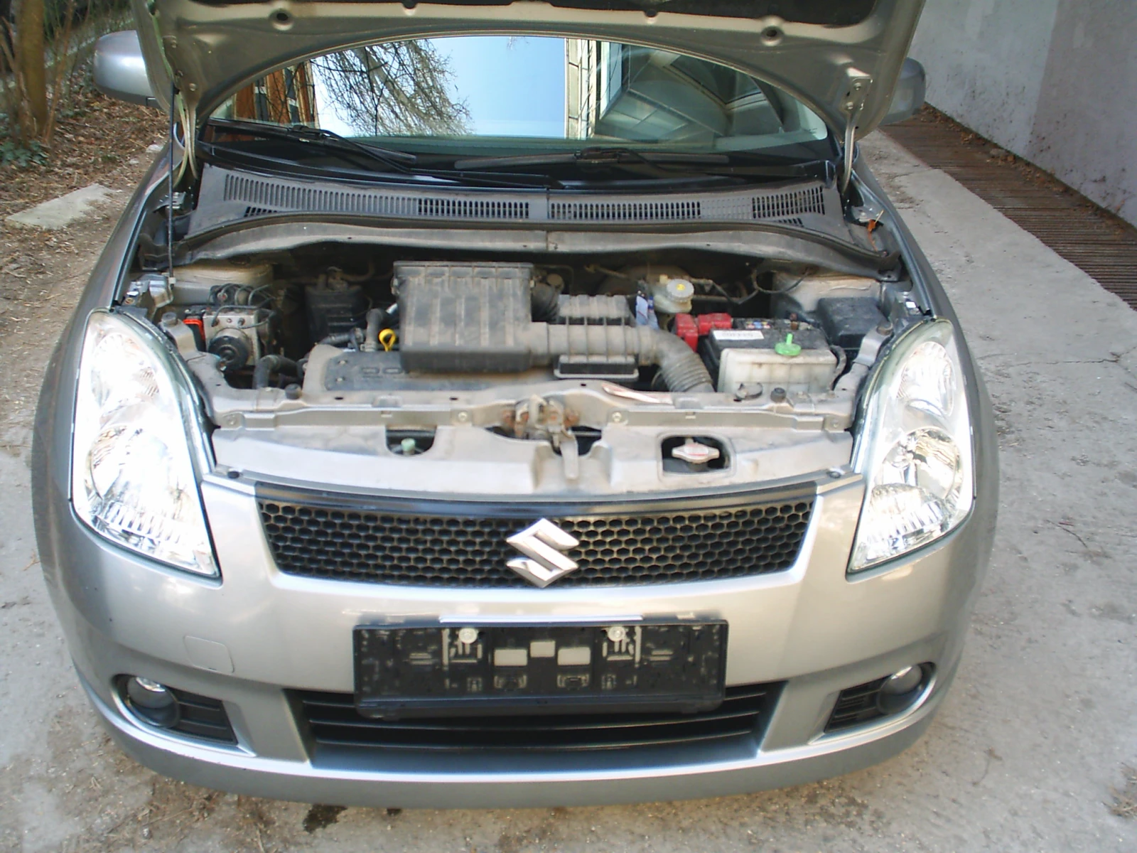 Suzuki Swift 1.3 16V 90k.c., снимка 14 - Автомобили и джипове - 53838132