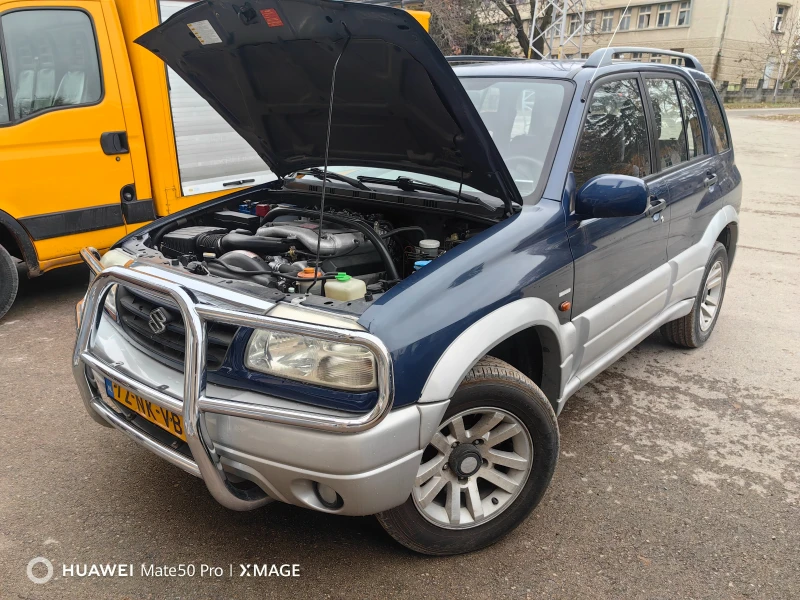 Suzuki Grand vitara 2.5i V6 4x4, снимка 11 - Автомобили и джипове - 46657410