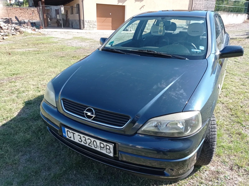 Opel Astra, снимка 15 - Автомобили и джипове - 47496092