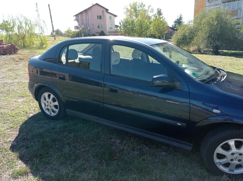 Opel Astra, снимка 14 - Автомобили и джипове - 47496092