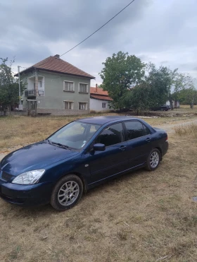 Mitsubishi Lancer 1.6i 98 - 1999 € - 16520461 2