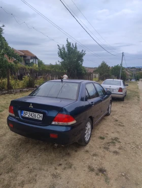 Mitsubishi Lancer 1.6i 98 - 1999 € - 16520461 4