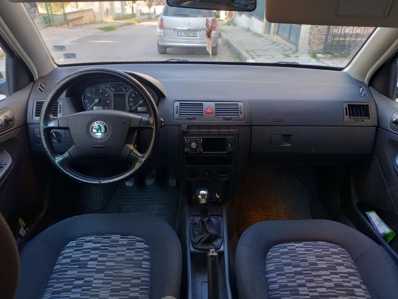 Skoda Fabia 1.4 ГАЗ КЛИМАТИК , снимка 9 - Автомобили и джипове - 47863317