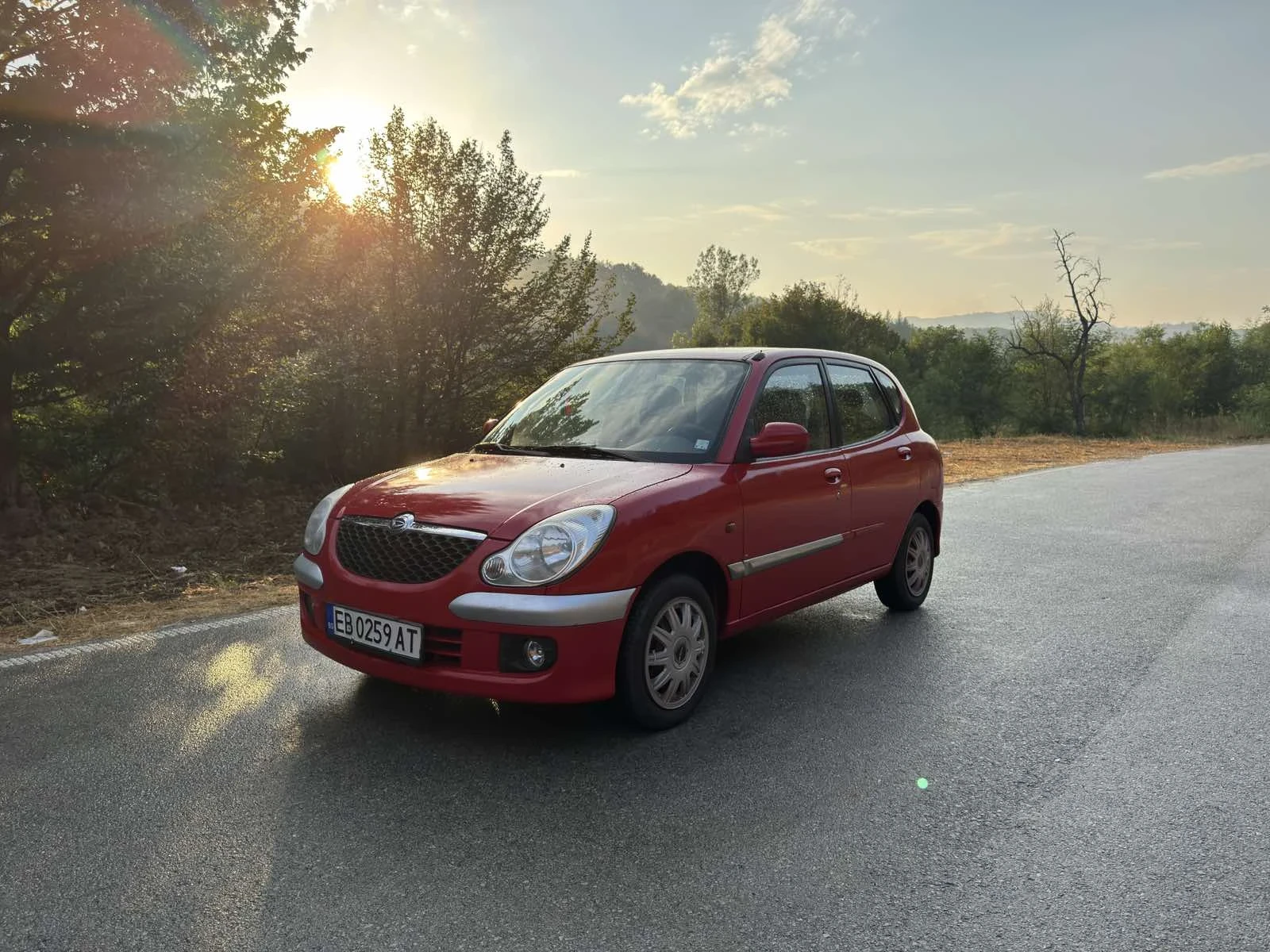Daihatsu Sirion 1.0 Автоматик, снимка 7 - Автомобили и джипове - 55826568