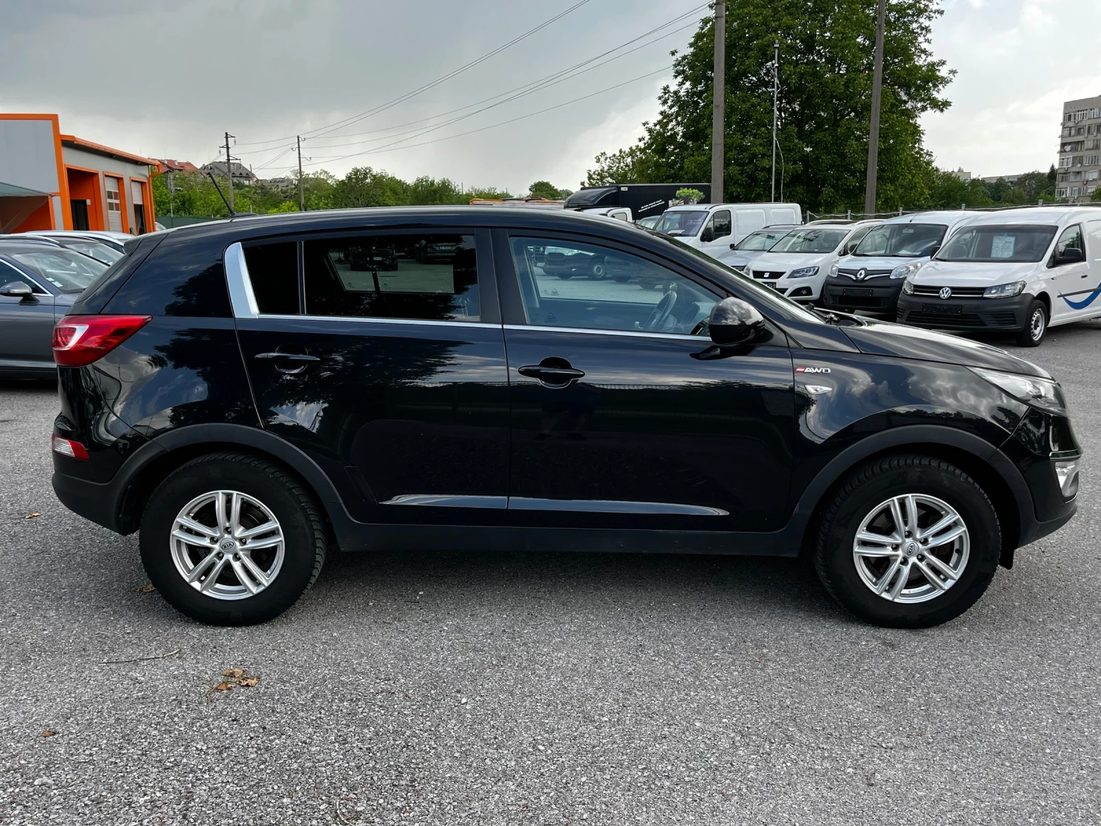 Kia Sportage 2.0CRDi AWD NAVI, снимка 6 - Автомобили и джипове - 54515947