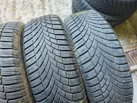 Гуми Зимни 215/65R16, снимка 3 - Гуми и джанти - 38496302