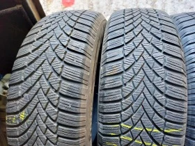 Гуми Зимни 215/65R16, снимка 2 - Гуми и джанти - 38496302