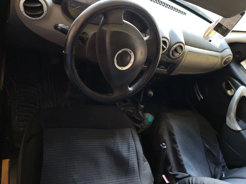 Dacia Sandero 1.4i, снимка 6 - Автомобили и джипове - 52590235