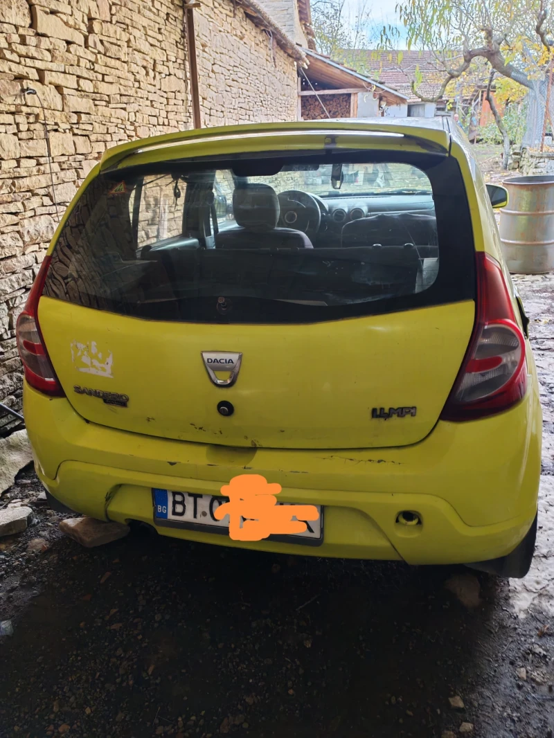 Dacia Sandero 1.4i, снимка 2 - Автомобили и джипове - 52590235