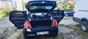 Suzuki Swift 1.3 Газ, снимка 11