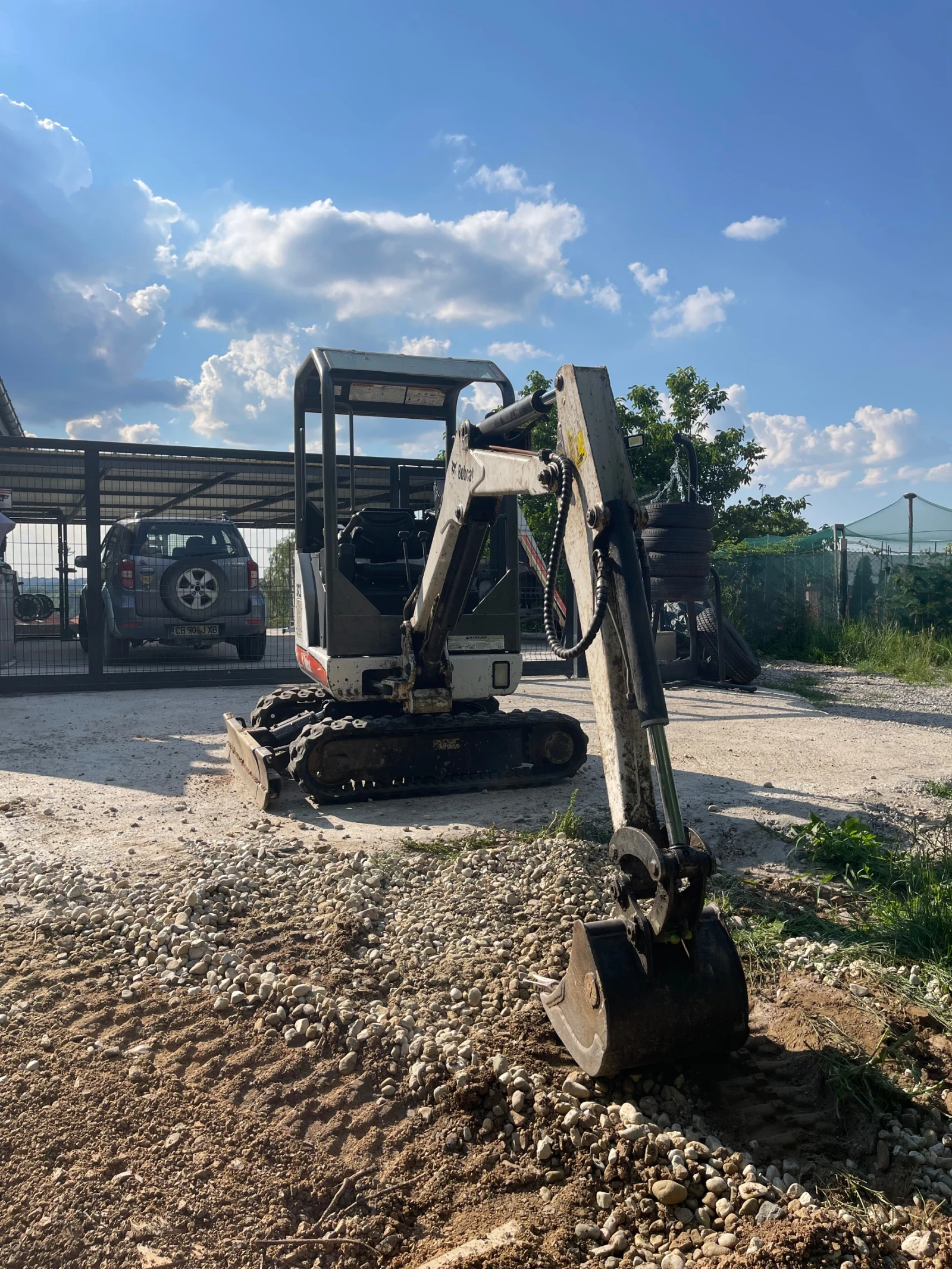 Багер Bobcat 323j