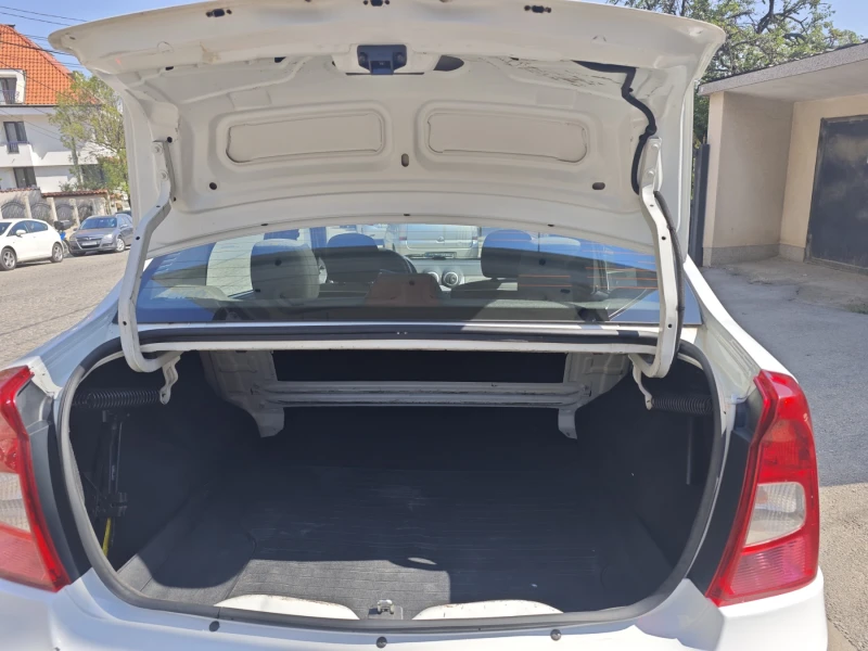 Dacia Logan dCI, снимка 14 - Автомобили и джипове - 52171667