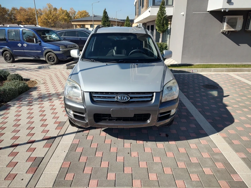 Kia Sportage 2.0 CRDI 4x4, снимка 9 - Автомобили и джипове - 48019385