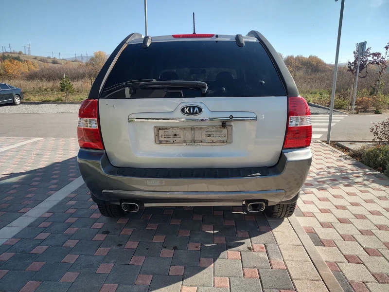 Kia Sportage 2.0 CRDI 4x4, снимка 11 - Автомобили и джипове - 48019385