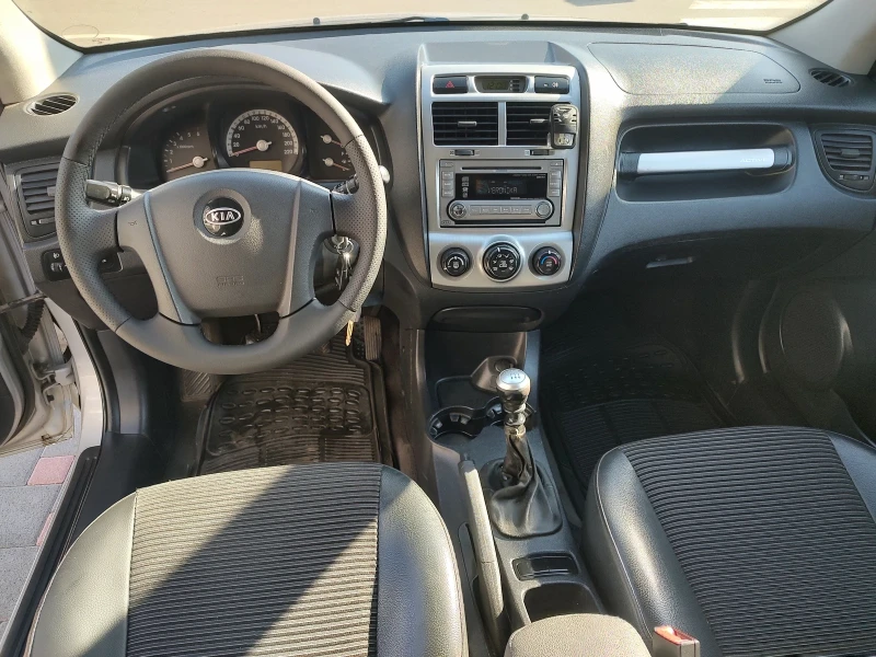 Kia Sportage 2.0 CRDI 4x4, снимка 14 - Автомобили и джипове - 48019385