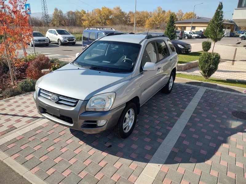 Kia Sportage 2.0 CRDI 4x4, снимка 10 - Автомобили и джипове - 48019385