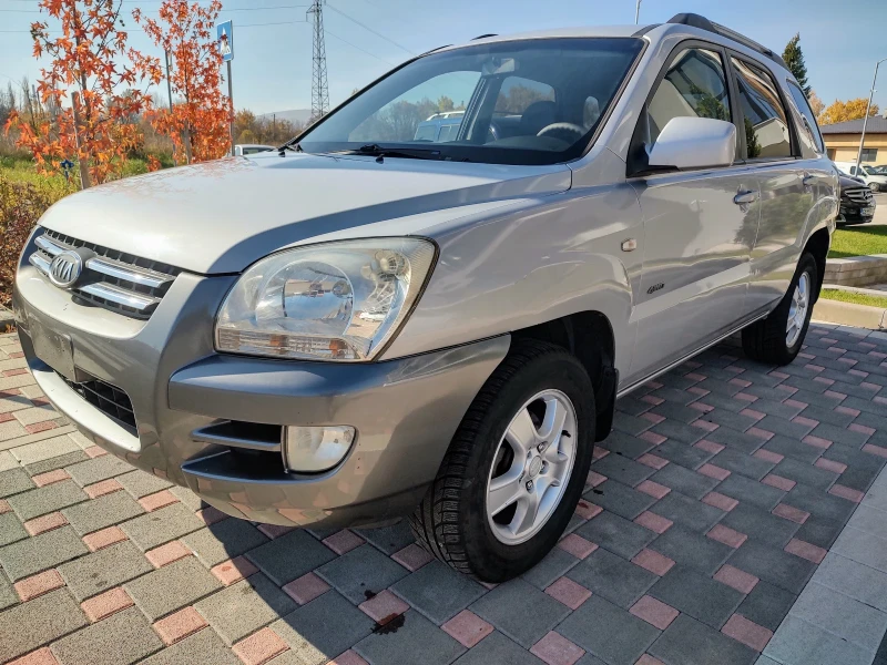 Kia Sportage 2.0 CRDI 4x4, снимка 8 - Автомобили и джипове - 48019385