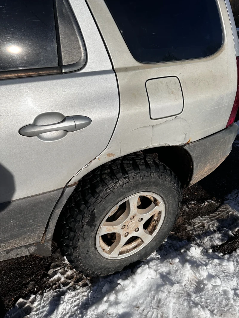 Mazda Tribute, снимка 12 - Автомобили и джипове - 53530600