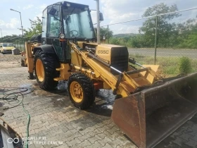 Багер New Holland 655c, снимка 13