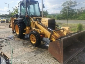 Багер New Holland 655c, снимка 12