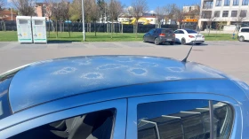 Opel Corsa 1.4 i - автоматик, снимка 14