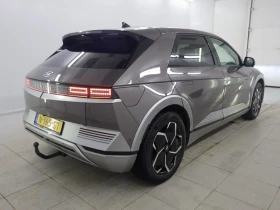 Hyundai Ioniq 5 73KWH/LOUNGE/AMBIENT/ЗИМНИ ГУМИ/KEYLESS - 20450 € / 39996.72 лв. - 52180412 2
