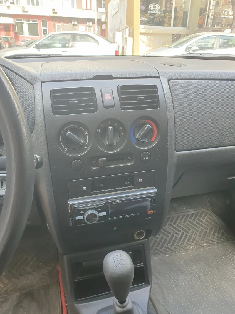 Daihatsu Sirion 1.0, снимка 9 - Автомобили и джипове - 52327301