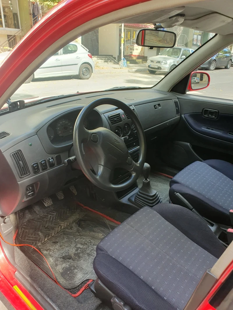 Daihatsu Sirion 1.0, снимка 12 - Автомобили и джипове - 52327301