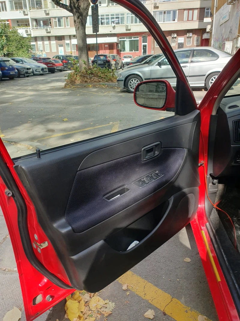 Daihatsu Sirion 1.0, снимка 11 - Автомобили и джипове - 52327301