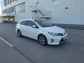 Toyota Auris 1.8HYBRID Navi Камера Подгрев - 7668 € / 14997.30 лв. - 66322242 2