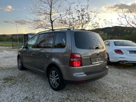 VW Touran 1.9 TDI DSG 7местен - 4999 € / 9777.19 лв. - 48674740 4