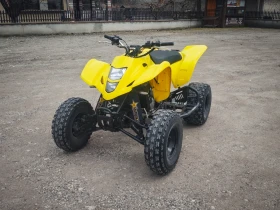 ������ Suzuki QuadSport