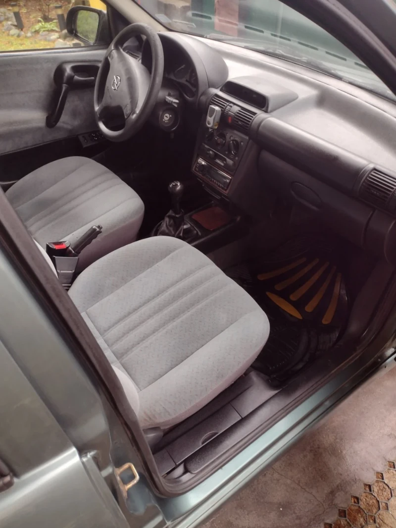 Opel Corsa, снимка 10 - Автомобили и джипове - 53403329